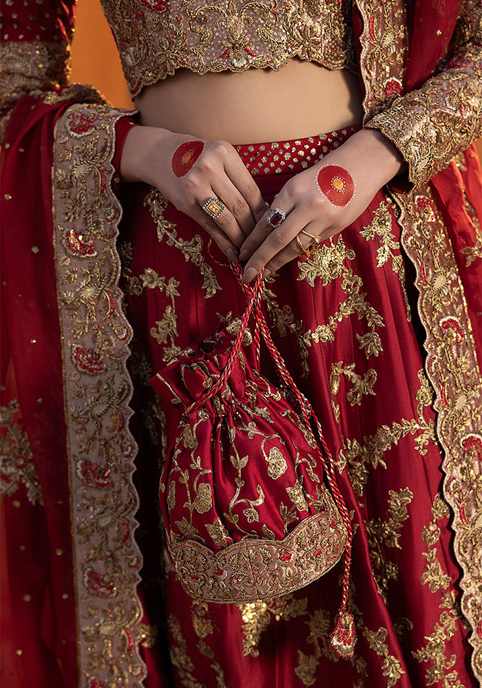 Hennaed hands over Virasat embroidery