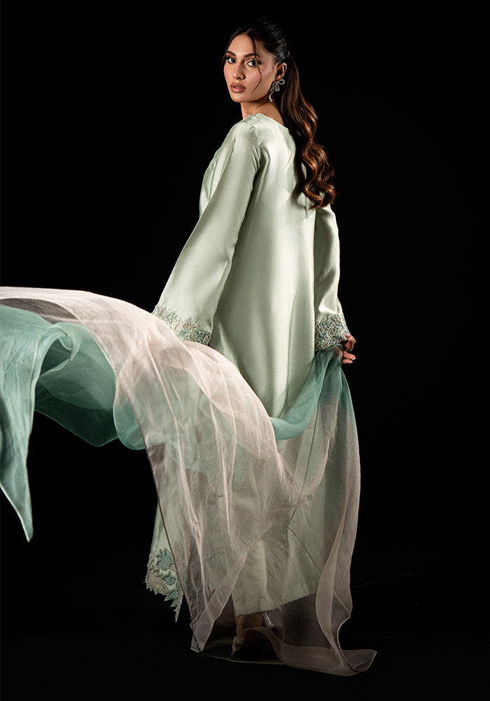 A mint Moonloom ensemble with a flowing dupatta